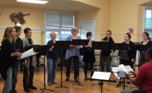 Polly rehearsing with Pacific Edge Voices.